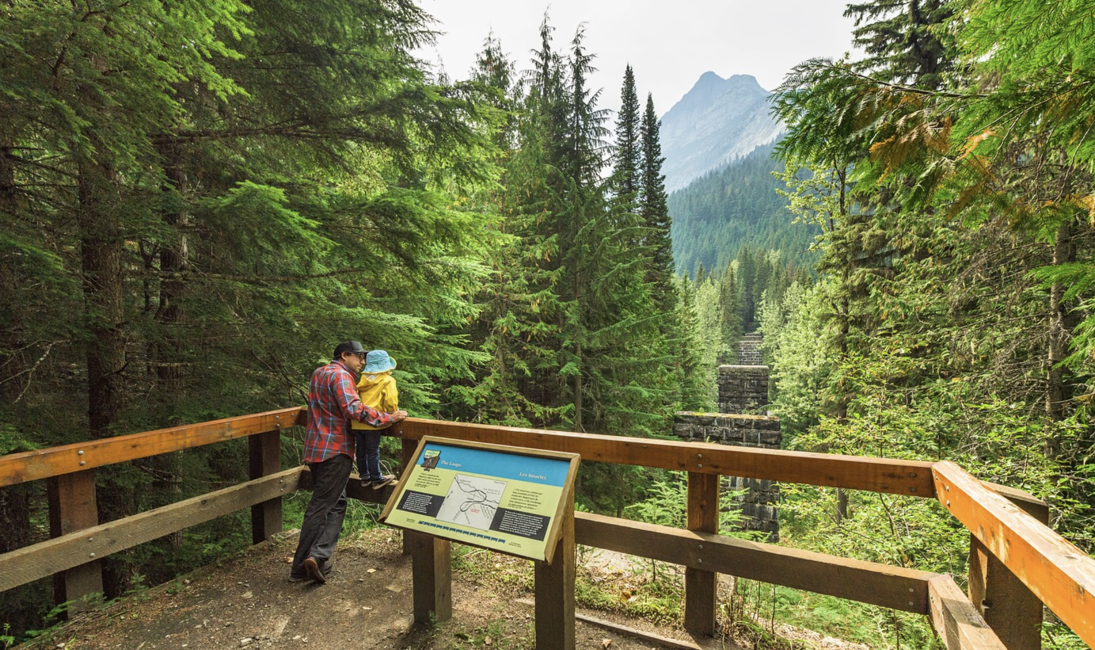 Adult and child at scenic lookout in Golden BC photo by Tourism Golden